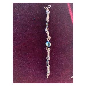 Handmade bracelets made out of natural materials.